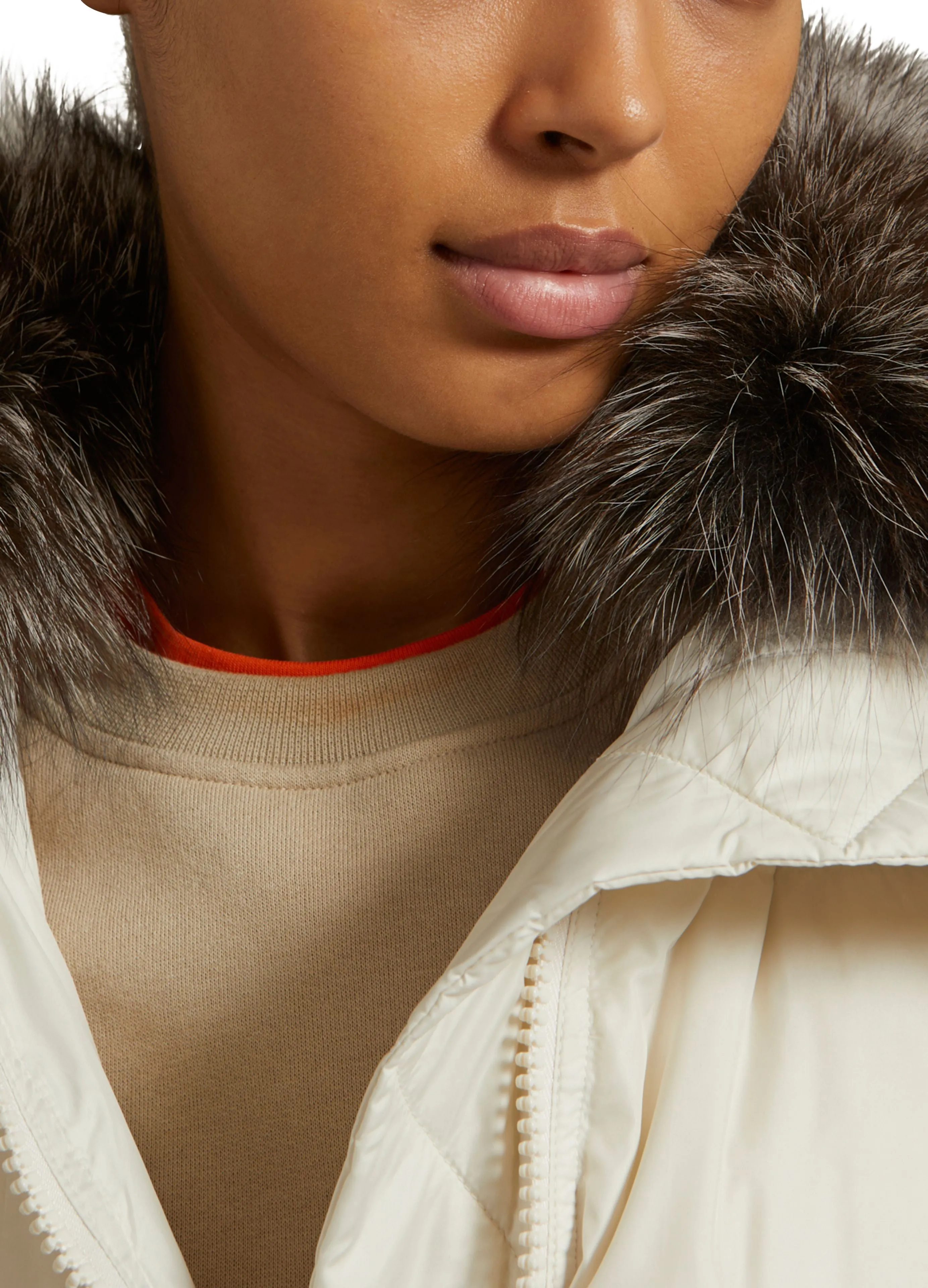 Short "A" line down jacket in water-repellent technical fabric with fox fur collar